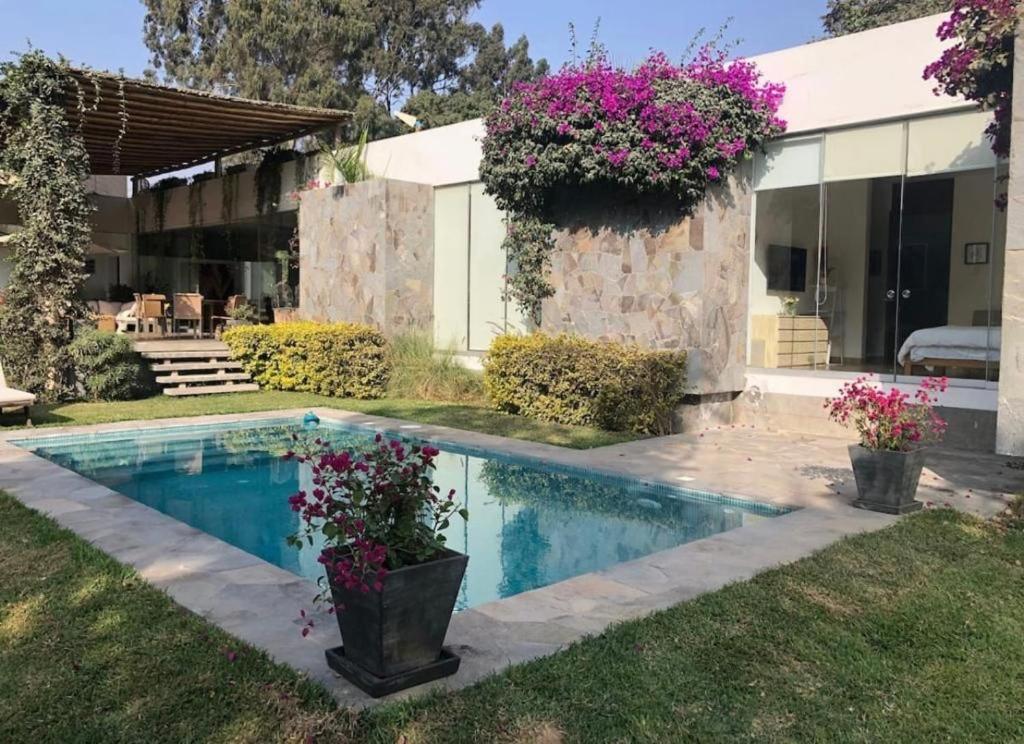 Bazén v ubytování Alquiler Casa de Campo Cieneguilla Exclusiva nebo v jeho okolí