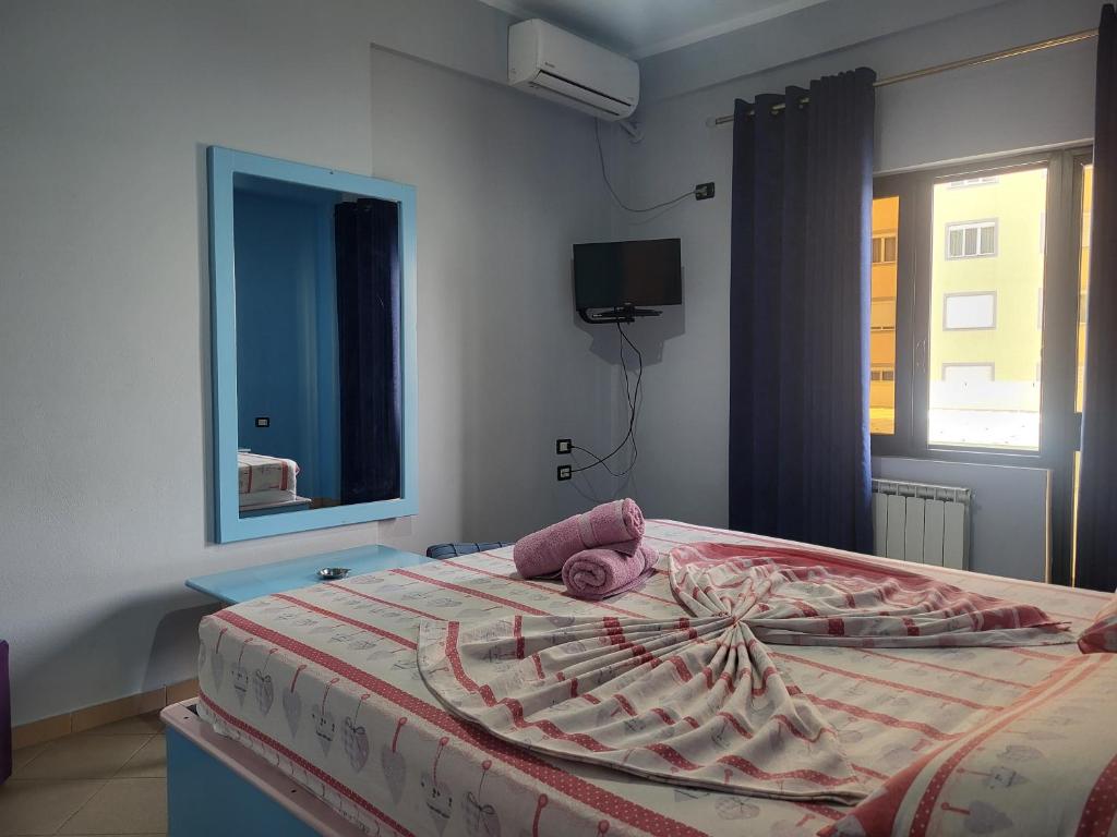Postel nebo postele na pokoji v ubytování Hotel Europa