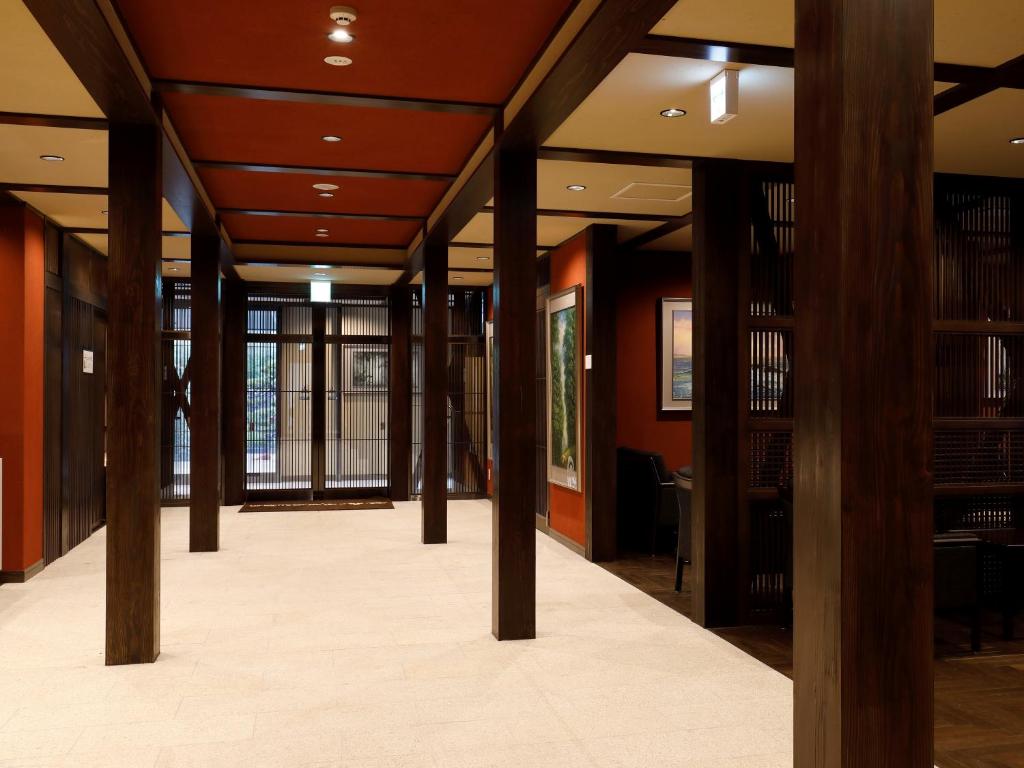 Postel nebo postele na pokoji v ubytování Hotel Morinokaze Hakone Sengokuhara