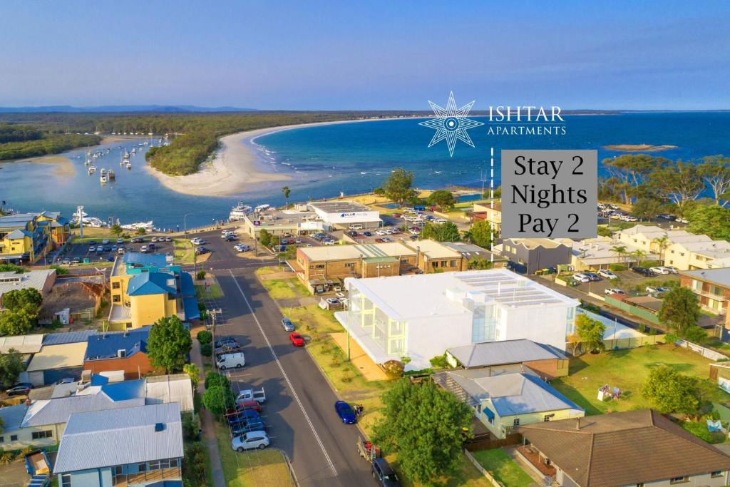 an aerial view of a small town with a beach at Ishtar Apartment 8- Luxury Studio in Huskisson