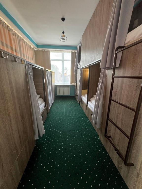 Letto o letti in una camera di All Eyes Hostel