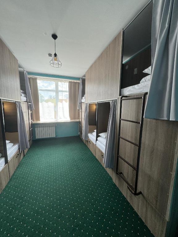 Letto o letti in una camera di All Eyes Hostel