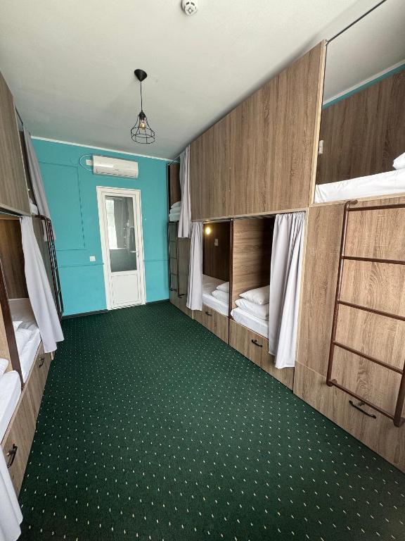 Letto o letti in una camera di All Eyes Hostel