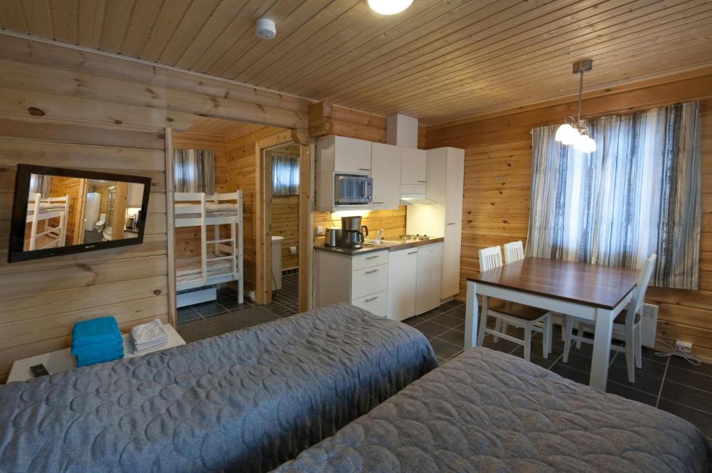 Kuchyň nebo kuchyňský kout v ubytování Kajaani Cottages