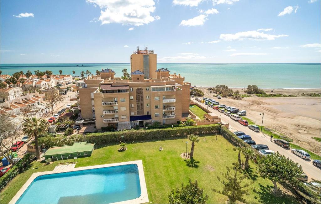 an aerial view of a hotel and the beach at Gorgeous Apartment In Malaga With House Sea View in Málaga