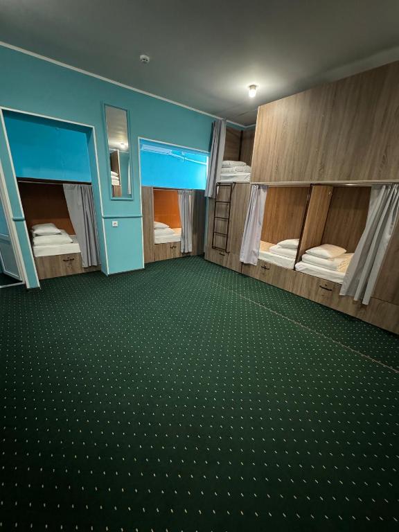 Letto o letti in una camera di All Eyes Hostel