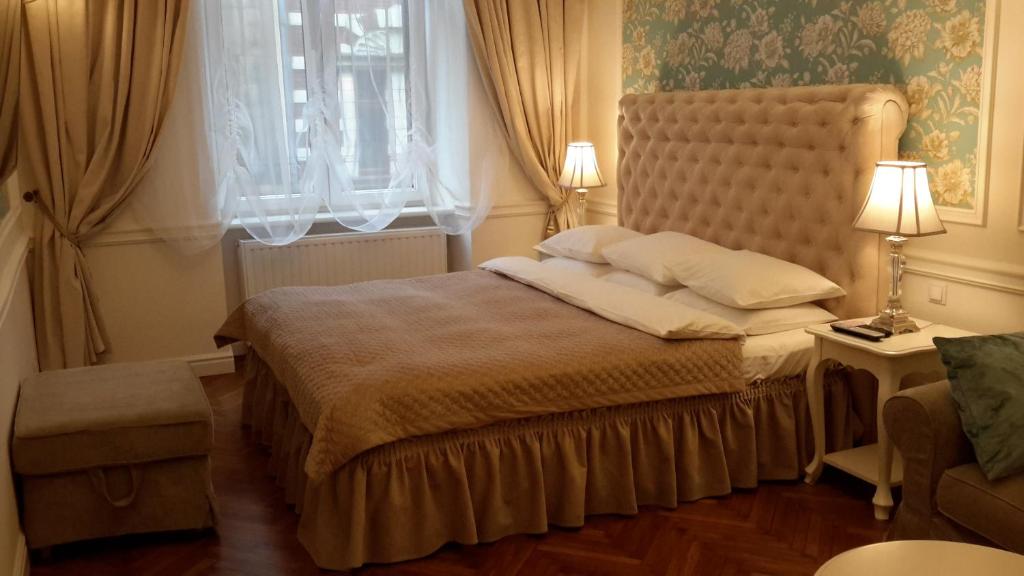 Posteľ alebo postele v izbe v ubytovaní Blueberry Apartments