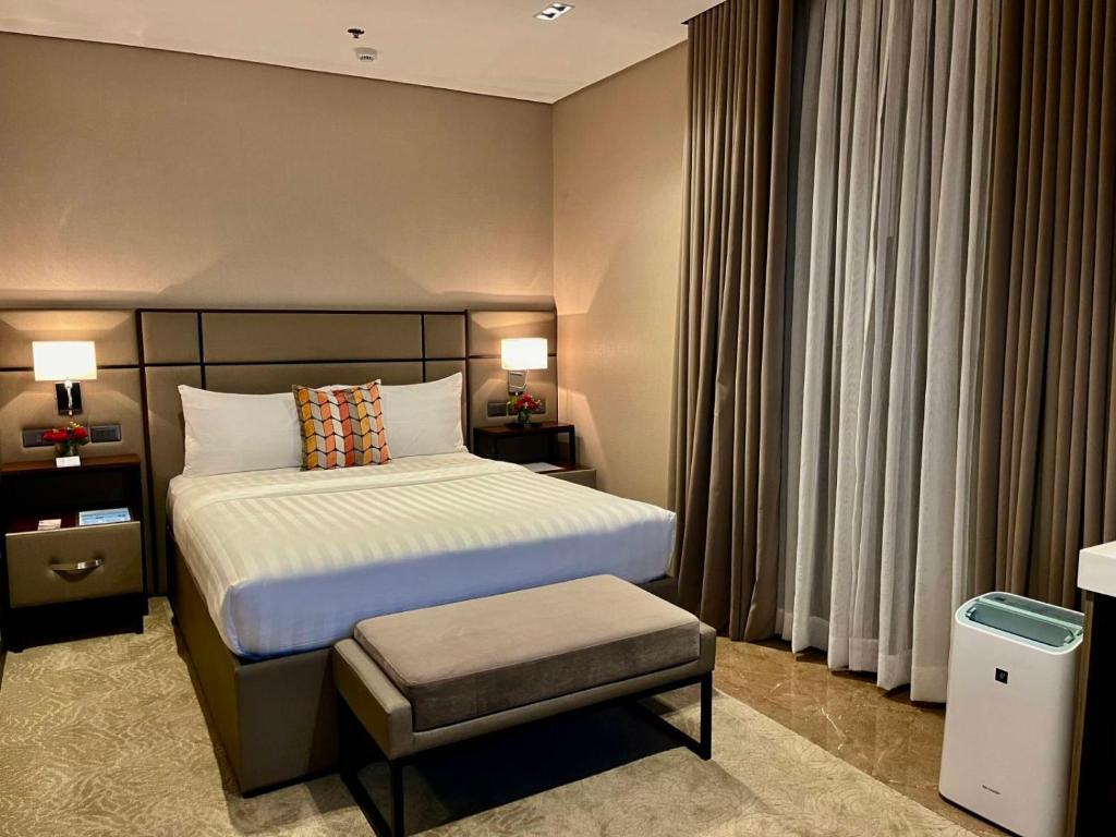 The Plaza Garden Hotel and Residences - Deluxe Queen Room