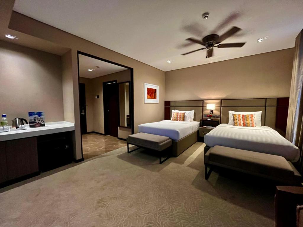 The Plaza Garden Hotel and Residences - Deluxe Room