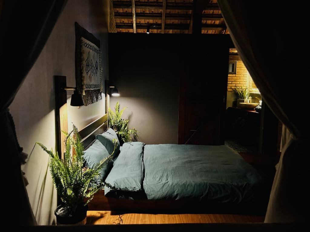 Postel nebo postele na pokoji v ubytování Pine Peak Bao Loc