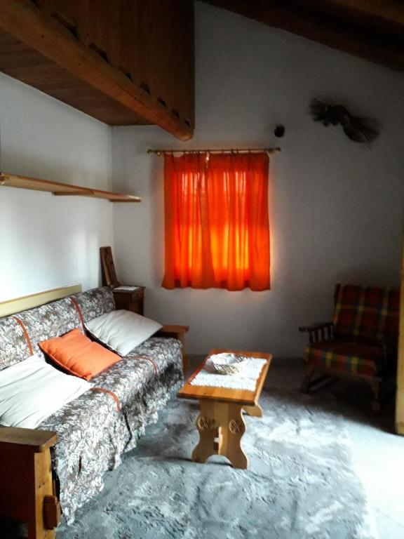 Postel nebo postele na pokoji v ubytování Monolocale di montagna