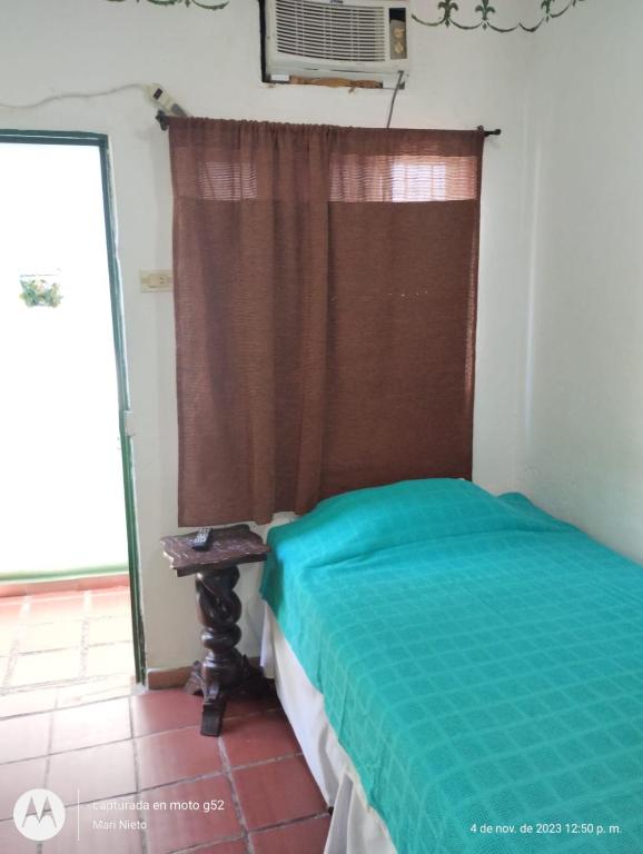Postel nebo postele na pokoji v ubytování La Casa de Taty