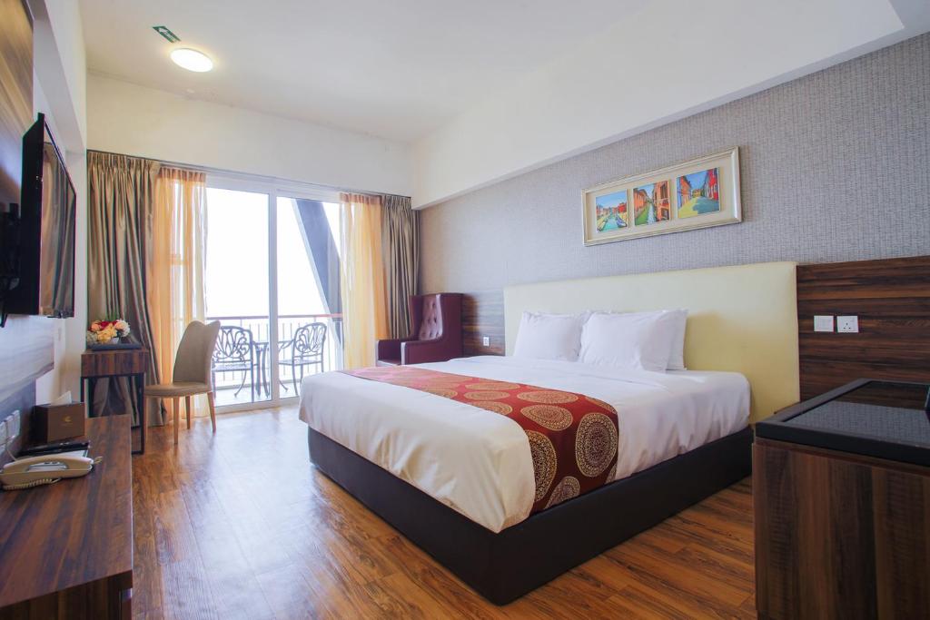Postel nebo postele na pokoji v ubytování AMERALD RESORT HOTEL DESARU