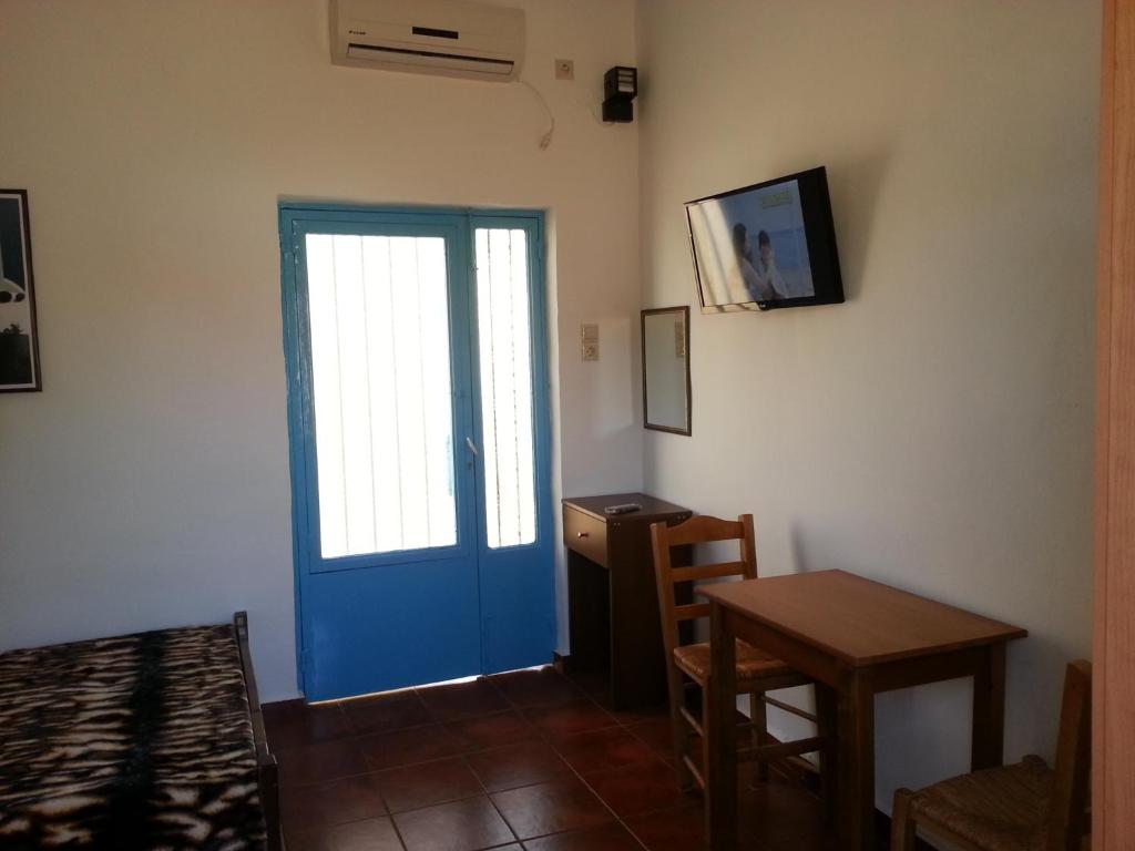 Televízia a/alebo spoločenská miestnosť v ubytovaní Vintage House-Vori-Rent Rooms