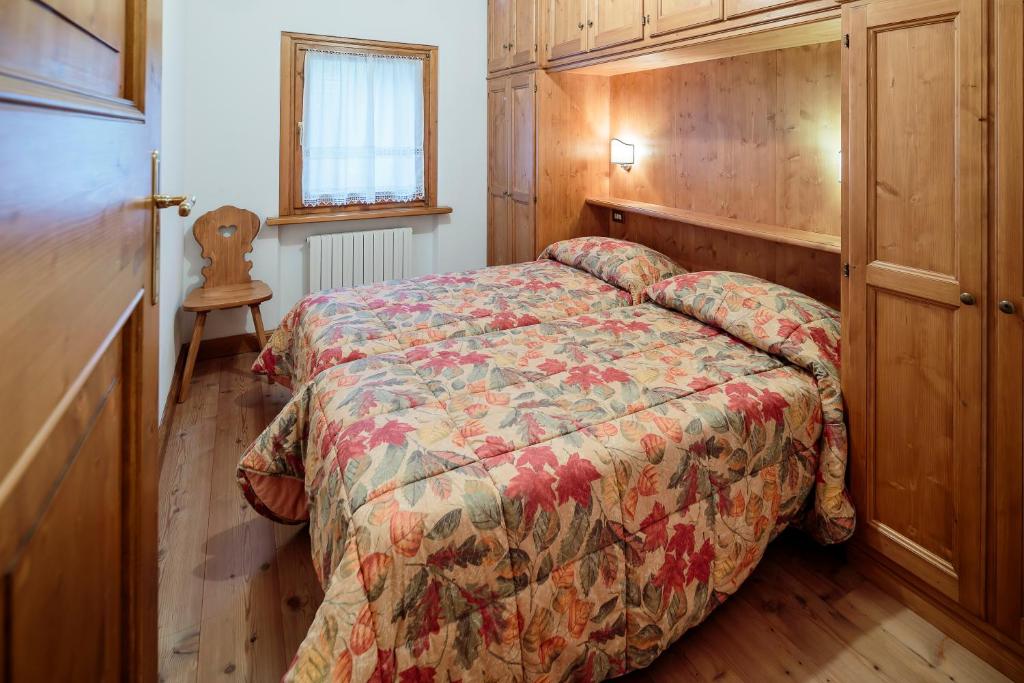 Łóżko lub łóżka w pokoju w obiekcie Villa Lacedel - Stayincortina
