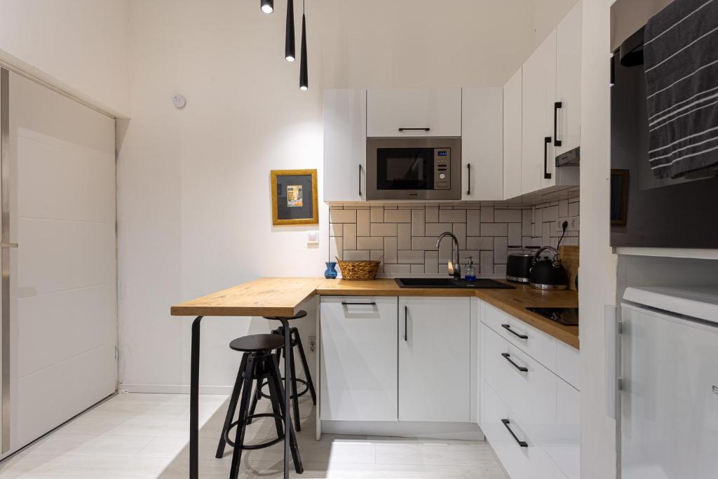 Una cocina o zona de cocina en Cozy Corner in the city center