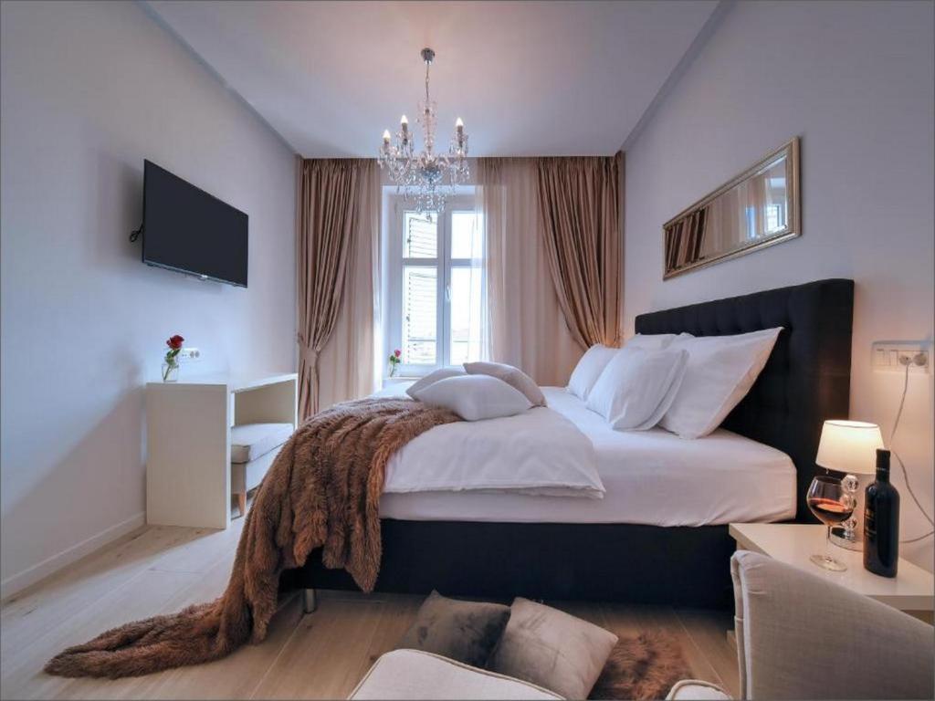 Posteľ alebo postele v izbe v ubytovaní Via Porto Rooms