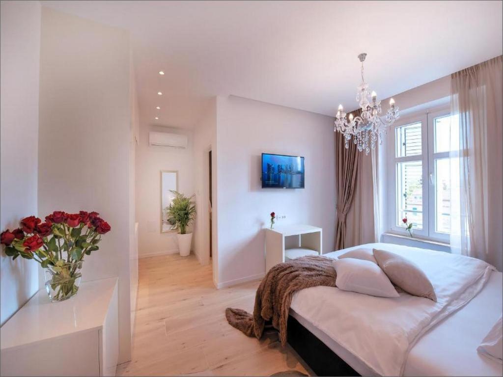 Posteľ alebo postele v izbe v ubytovaní Via Porto Rooms