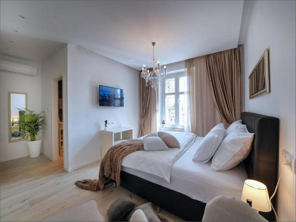 Posteľ alebo postele v izbe v ubytovaní Via Porto Rooms