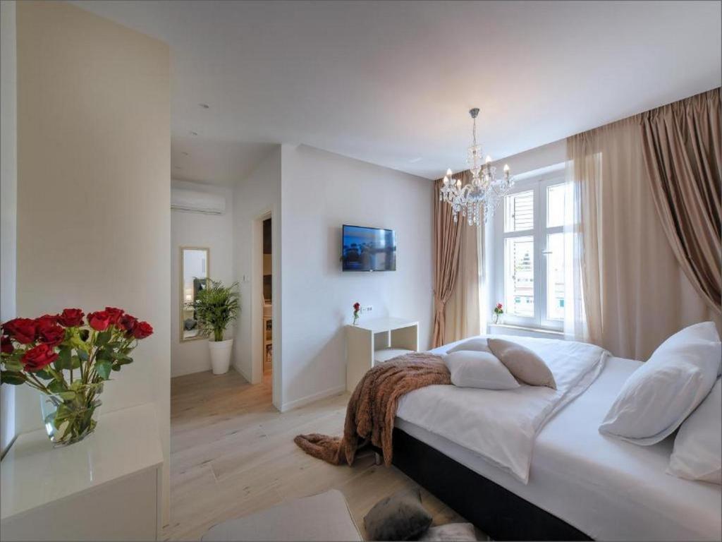 Posteľ alebo postele v izbe v ubytovaní Via Porto Rooms