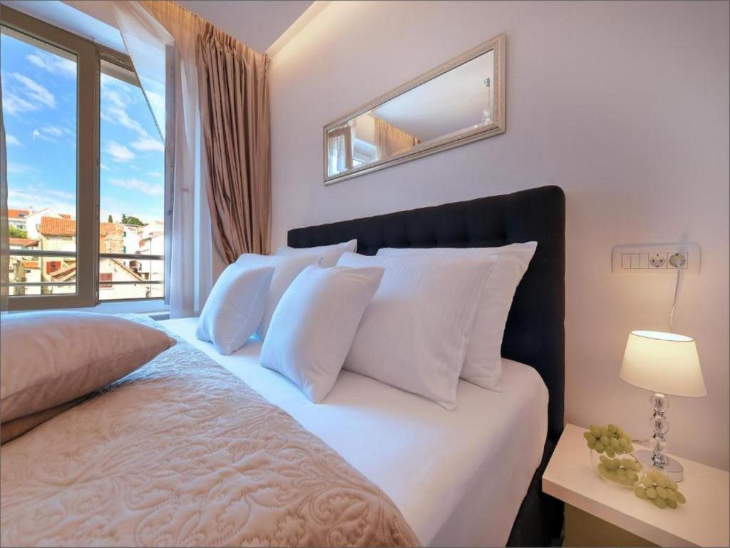 Posteľ alebo postele v izbe v ubytovaní Via Porto Rooms