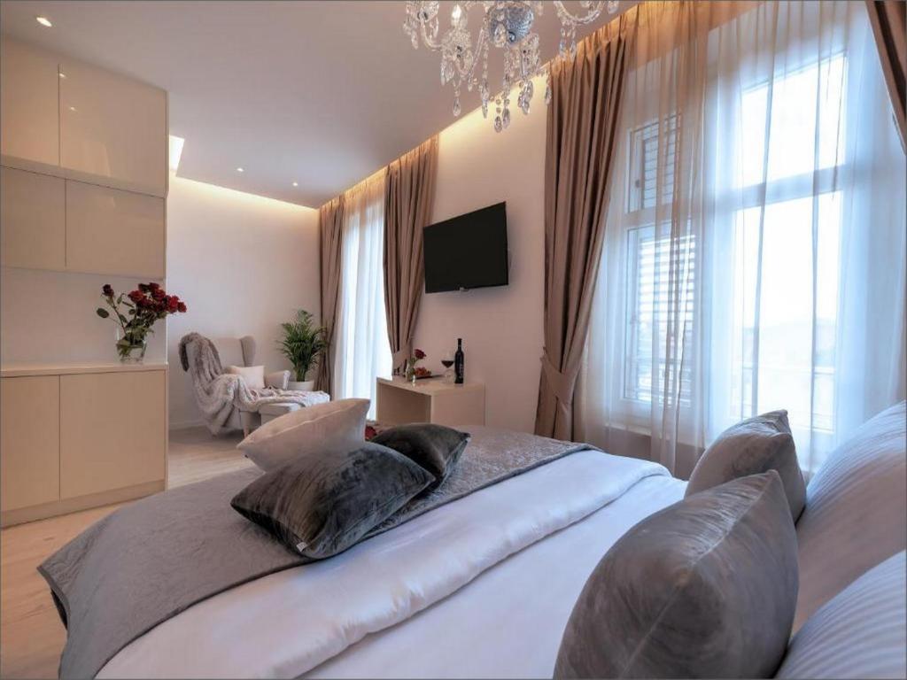 Posteľ alebo postele v izbe v ubytovaní Via Porto Rooms