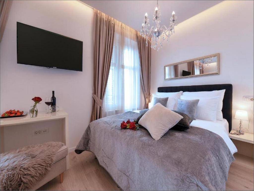 Posteľ alebo postele v izbe v ubytovaní Via Porto Rooms