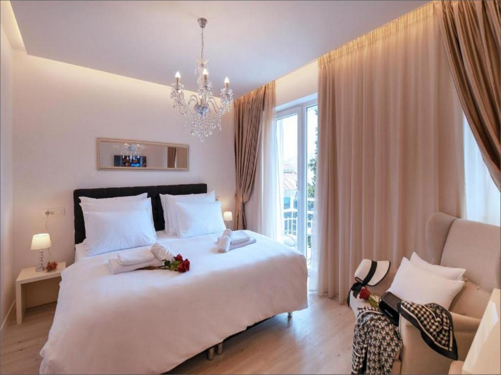 Posteľ alebo postele v izbe v ubytovaní Via Porto Rooms