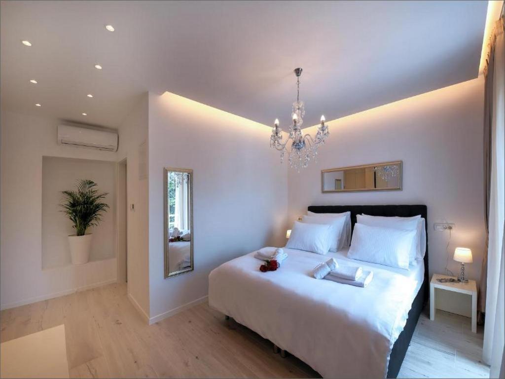 Posteľ alebo postele v izbe v ubytovaní Via Porto Rooms