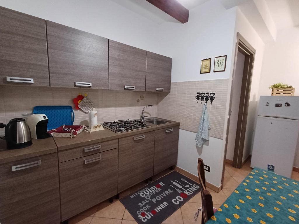 Kuchyň nebo kuchyňský kout v ubytování La dépendance di Andreina