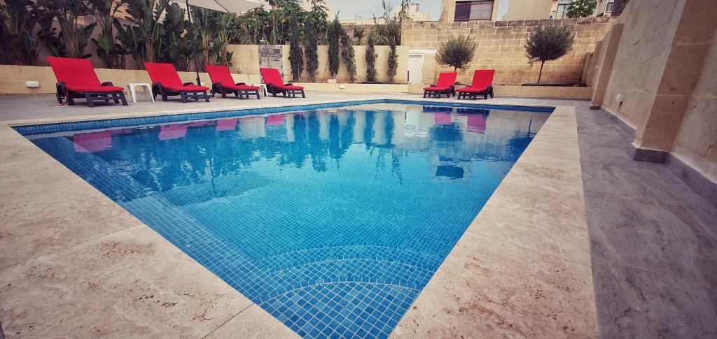Bazén v ubytování Mgarr ix-Xini Holiday apartment nebo v jeho okolí