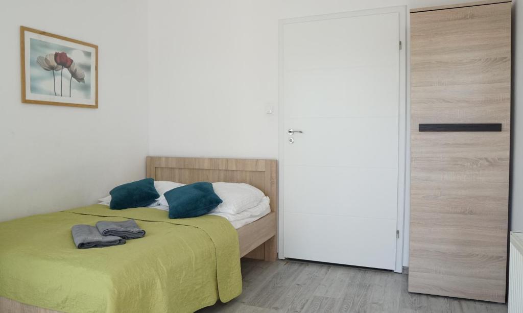 Postelja oz. postelje v sobi nastanitve Nova Przystań