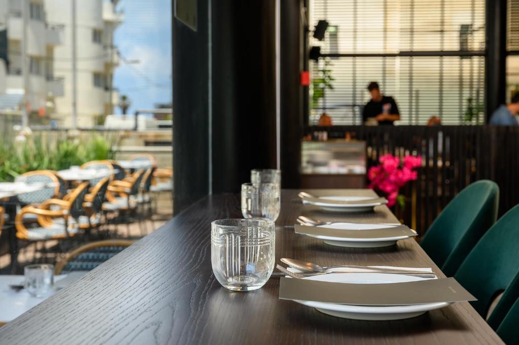 Restaurace v ubytování Hotel Poli Urban By AFI Hotels