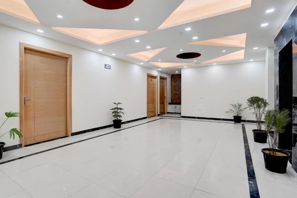 TV a/nebo společenská místnost v ubytování FabHotel Sky