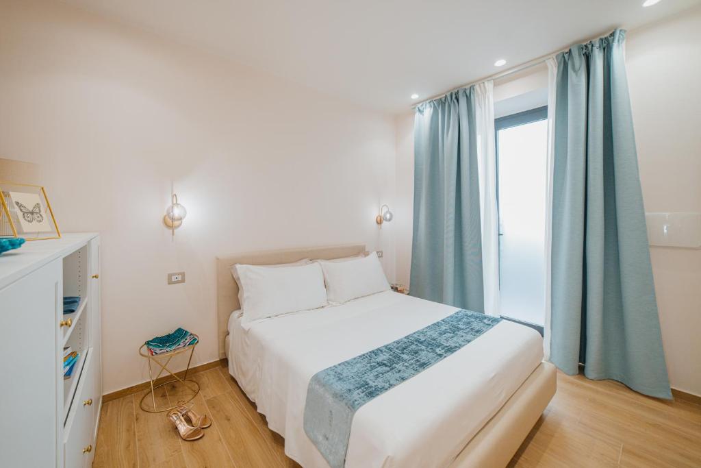 Postel nebo postele na pokoji v ubytování Frangimare Holiday Home