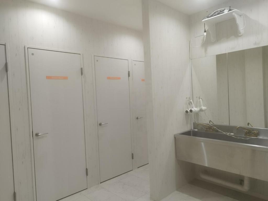 Koupelna v ubytování GATE80長居