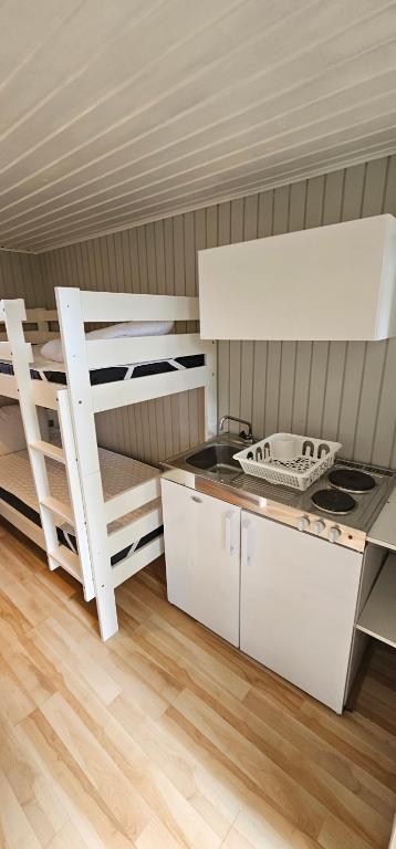 Kuchyň nebo kuchyňský kout v ubytování My Camping Tredenborg