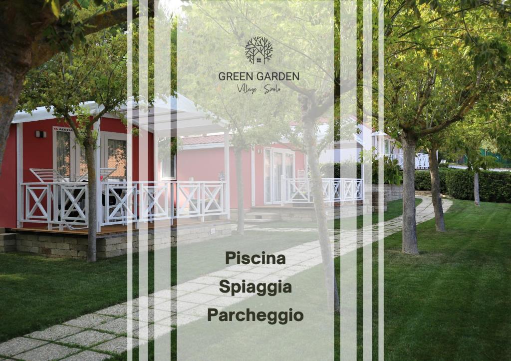 a picture of a house with the words green garden usa and the words p at Green Garden Village in Sirolo