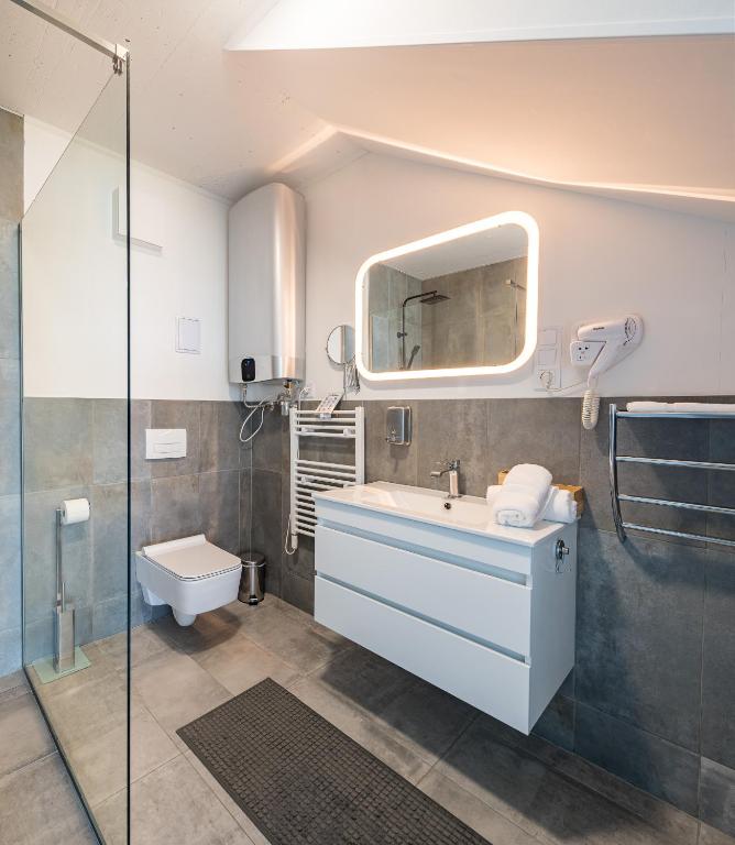 Kúpeľňa v ubytovaní Akvarell Apartmanház
