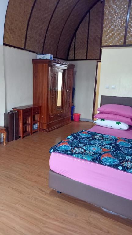 Postel nebo postele na pokoji v ubytování Villa Army Tabanan