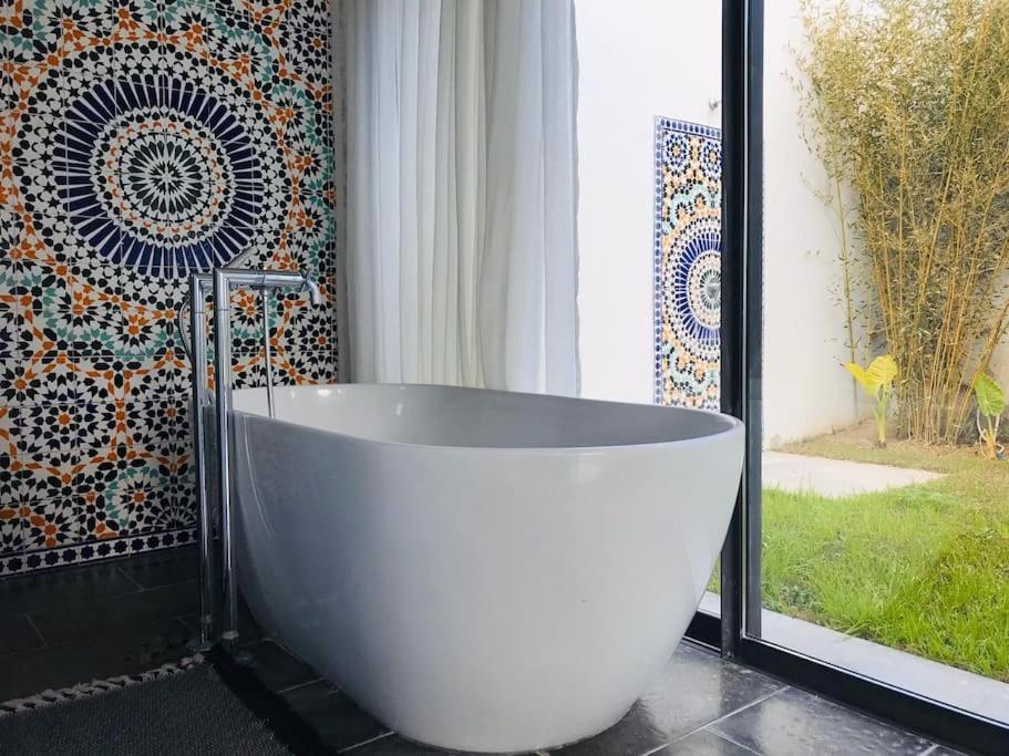 Ένα μπάνιο στο DAR OULED SOLTANE, havre de paix à Gammarth