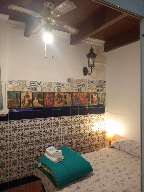 Posteľ alebo postele v izbe v ubytovaní Pensión Santa María la Blanca