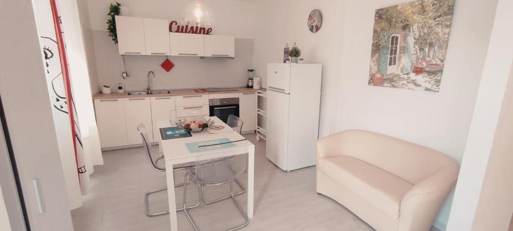 Kuchyň nebo kuchyňský kout v ubytování La casa Rosa