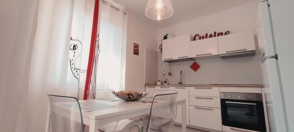Kuchyň nebo kuchyňský kout v ubytování La casa Rosa