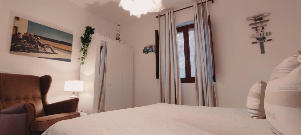 Postel nebo postele na pokoji v ubytování La casa Rosa