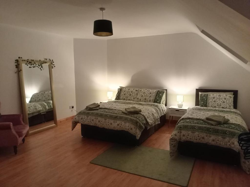 Postel nebo postele na pokoji v ubytování Charlestown bungalow