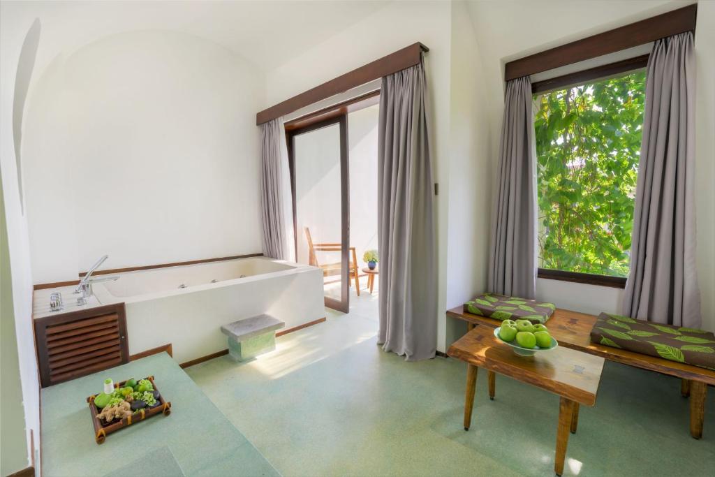 Posezení v ubytování Anmira Resort & Spa Hoi An by The Unlimited Collection, Managed by the Ascott
