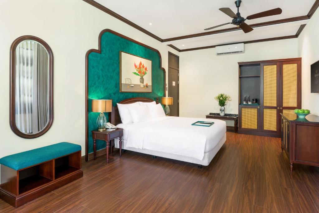 Postel nebo postele na pokoji v ubytování Anmira Resort & Spa Hoi An by The Unlimited Collection, Managed by the Ascott