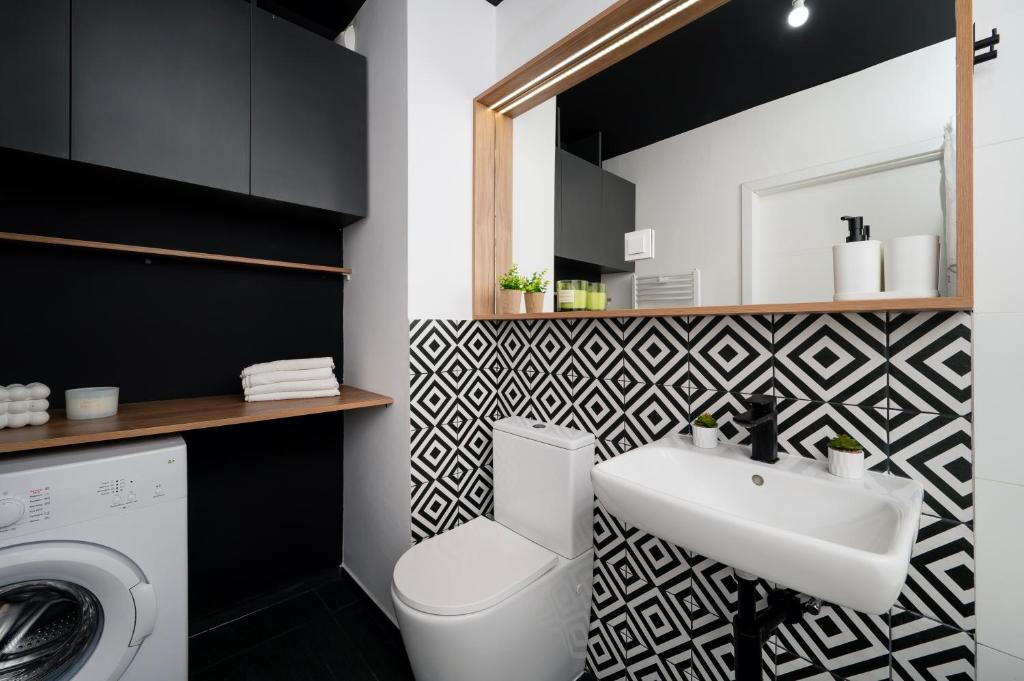 Kúpeľňa v ubytovaní Lumina cozy apartments Manufaktura