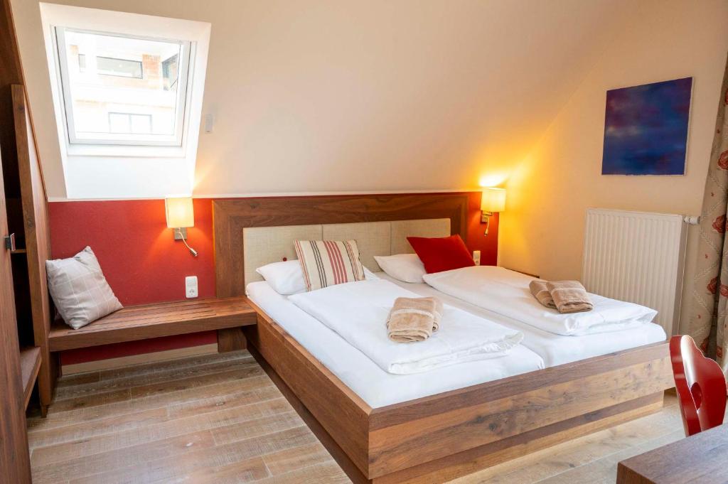 Postel nebo postele na pokoji v ubytování Winzerzimmer Scharl